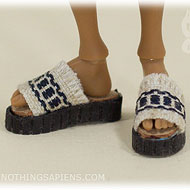 AmiGaTa wearing slide sandals