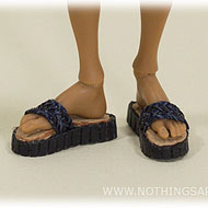 AmiGaTa wearing slide sandals